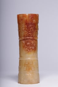 A Rare Archaic Jade Beast Face Pattern Bead