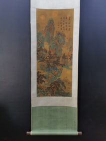 A vertical scroll of Chinese ink landscape painting on silk