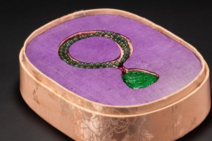 A Rare Jadeite Pendant with Carved Dragon Pattern
