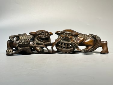 A Rare Huanghuali Wood Lion Playing with Ball Ornament