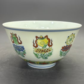 A Rare Doucai Eight Auspicious Pattern Bowl