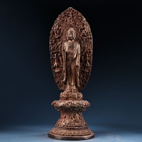 A Rare Coppery Mud-gilded Standing Statue of Sakyamuni