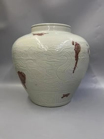A Rare Underglaze-Red Carved Double Dragon Pattern Jar