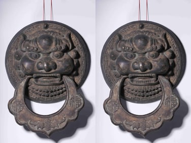 A Rare A pair of Bronze Door Knocker