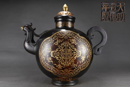 A Rare Gilded Purple Copper Body Eight Treasures Pattern Phoenix-head Ewer