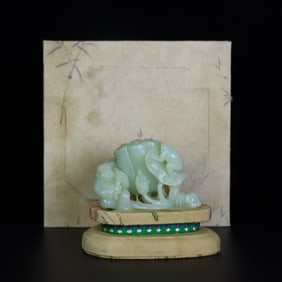 A Rare Hetian Jade Figure and Lotus Ornament