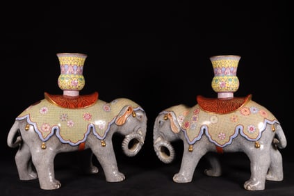 A pair of Rare Famille-Rose Elephant-Shaped Ornaments?