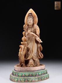 A Rare Hibiscus Stone Carved Dragon Riding Avalokitesvara Statue