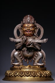 A Rare Gilt Silver Treasure Staff Guardian Statue
