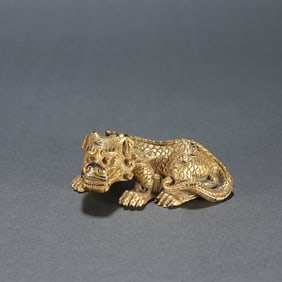 A Rare Gilt Bronze Auspicious Beast Paper Ruler
