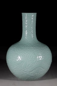A Rare Celadon glazed seawater dragon pattern vase