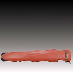 An Exquisite Carved Red Lacquer 'qin' Ornament