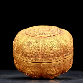 An exquisite gilt bronze box with flowers and birds