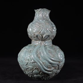 An Exquisite Robin's-Egg-Glazed Carved Gourd-Shaped Vase