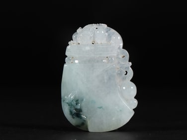A Fine Jadeite Auspicious Beast Pendant