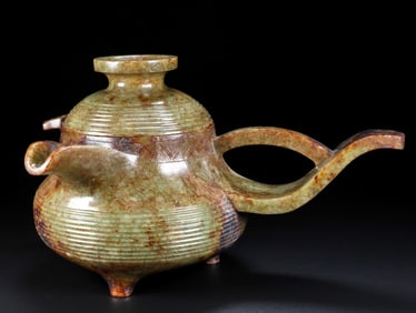 An Exquisite White Jade Tripod Ewer