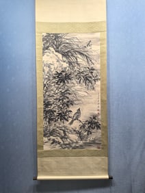 A vertical scroll of Chinese ink flower and bird painting on paper