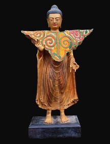 A Rare Gilt Bronze Vairocana Buddha Standing Statue