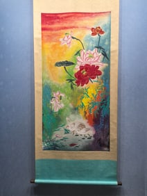 A vertical scroll of Chinese ink flower and bird painting on paper