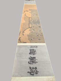 A vertical scroll of Chinese ink crane painting on paper