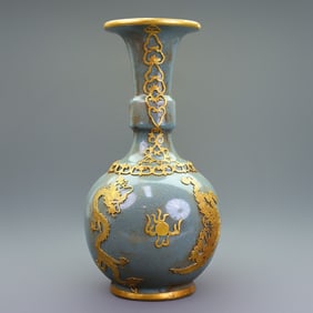 A Rare Ru yao Gold-covered Dragon and Phoenix Vase