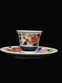 A Rare Blue and White Iron Red Auspicious Cloud and Dragon Pattern Cup