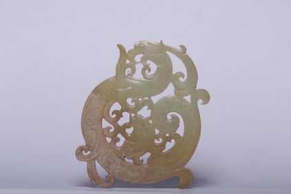 A Rare Archaic Jade Coiled Dragon Flying Beast Pendant