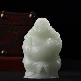A Rare Luminous Stone Carved Maitreya Buddha
