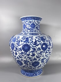 A Rare Blue and White Lotus Eight Treasures Pattern zun