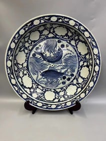 A Rare Blue and White Carved Fish and Algae Pattern Plate