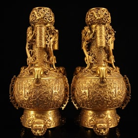 A pair of Rare Coppery High Relief Carved and Gilded Vases