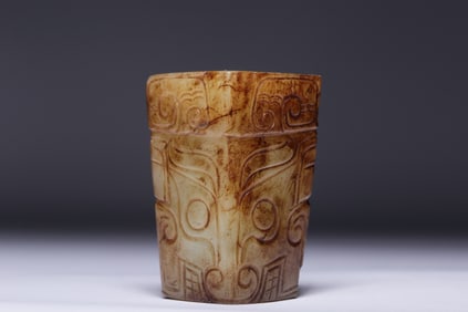 A Rare Archaic Jade Beast Face Pattern Bead