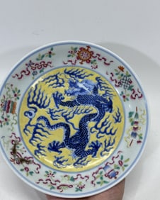 A Rare Famille-Rose Eight Treasures and Dragon Pattern Plate