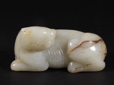 An Exquisite White Jade Auspicious Beast Ornament