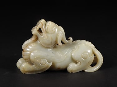 An Exquisite White Jade Auspicious Beast Ornament