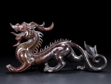 An Exquisite White Jade Dragon Ornament