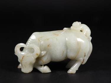 An Exquisite White Jade Buffalo Ornament