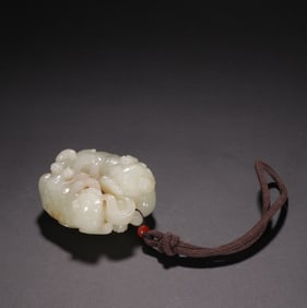 An Exquisite White Jade Lion Pattern Pendant
