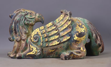 An Exquisite Bronze Inlaid Gold and Silver Auspicious Beast Ornament