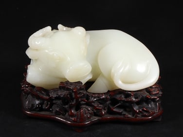 An Exquisite White Jade Buffalo Ornament