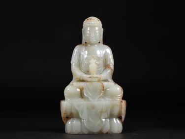 An Exquisite White Jade Statue of Sakyamuni