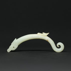 An Exquisite White Jade Dragon Pendant