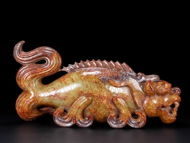 An Exquisite White Jade Auspicious Beast Ornament