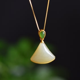 An Exquisite Sterling Silver-Gold Plated Inlaid White Jade Pendant