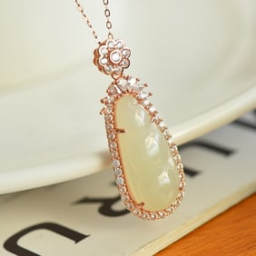An Exquisite Sterling Silver Inlaid White Jade Pendant