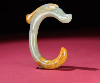 An Exquisite White Jade Dragon Pendant