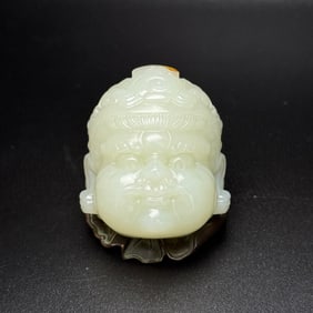 An Exquisite White Jade Buddha-head Pendant