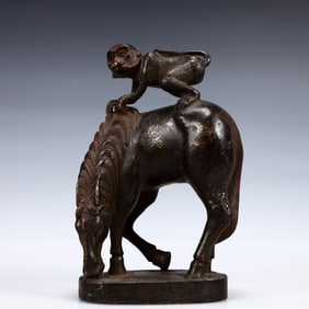 A Solemn Gilt Bronze Horse and Monkey Ornament