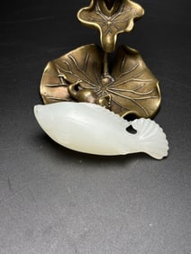 An Exquisite White Jade Fish Hand Piece