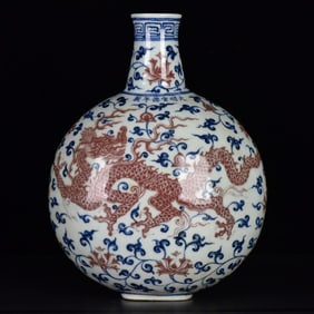A Rare Blue and White Underglaze-Red Lotus and Dragon Pattern Vase